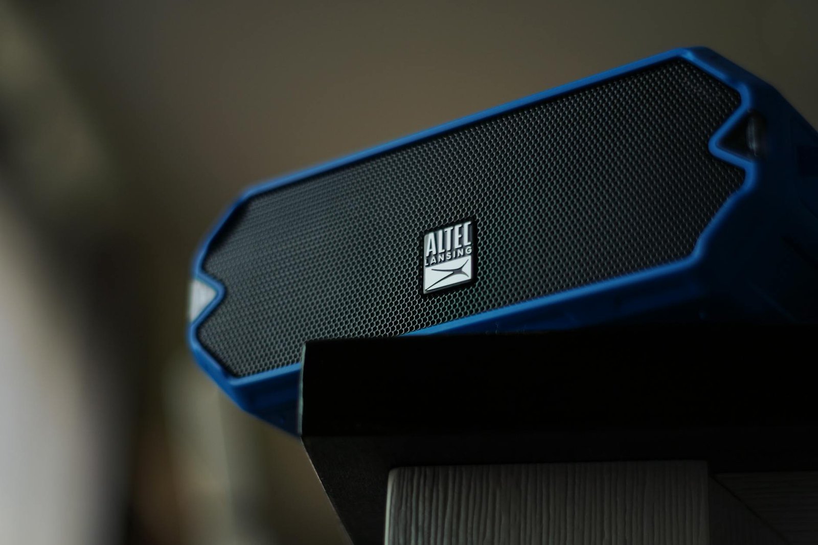 Close-up image of an Altec Lansing portable speaker with a focus on its grille design.