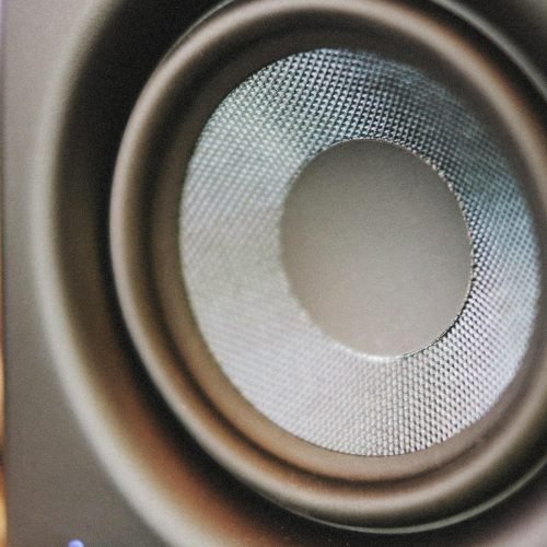 Detailed image of a modern speaker cone, highlighting audio technology and sound dynamics.