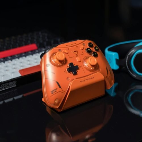 Dynamic gaming setup featuring an orange controller, keyboard, and blue headset.