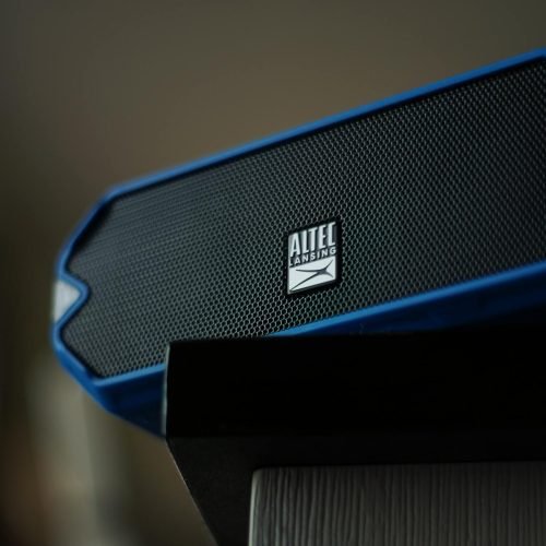 Close-up image of an Altec Lansing portable speaker with a focus on its grille design.